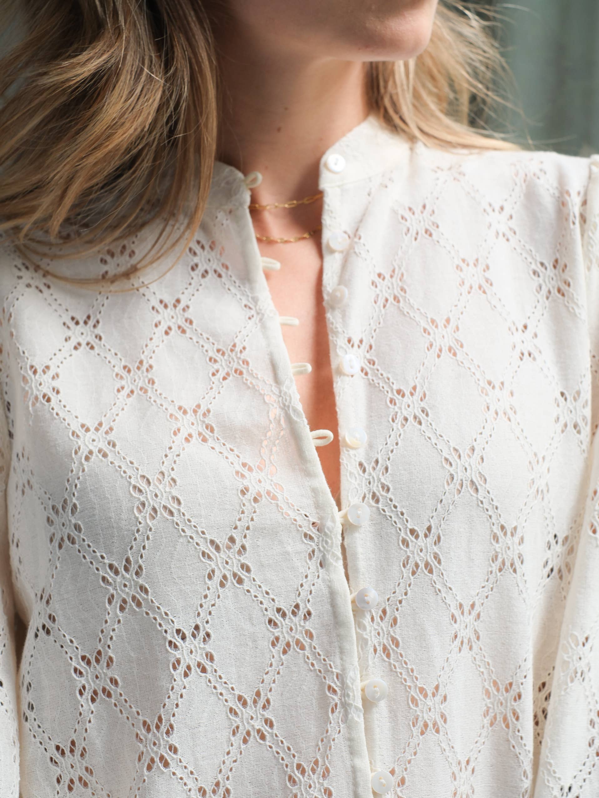 LOVIE & C0 Eyelet embroidery blouse with tied cuffs